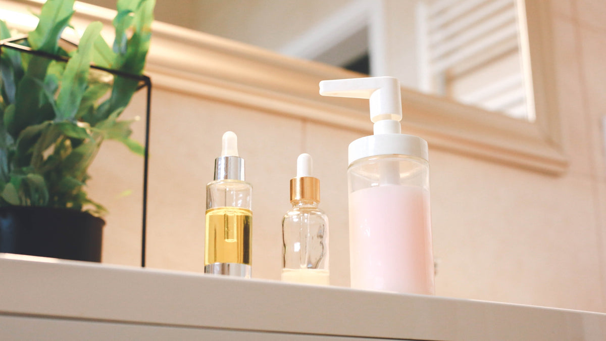 natural skincare bottles on beige background